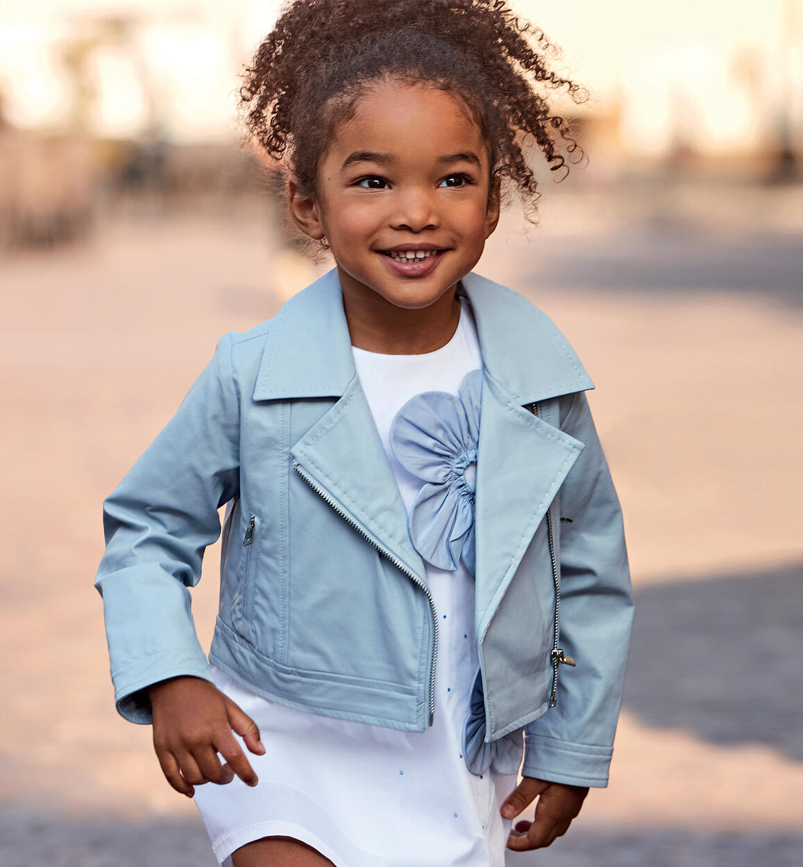 Girls' biker jacket in shiny fabric  BLUE Sarabanda